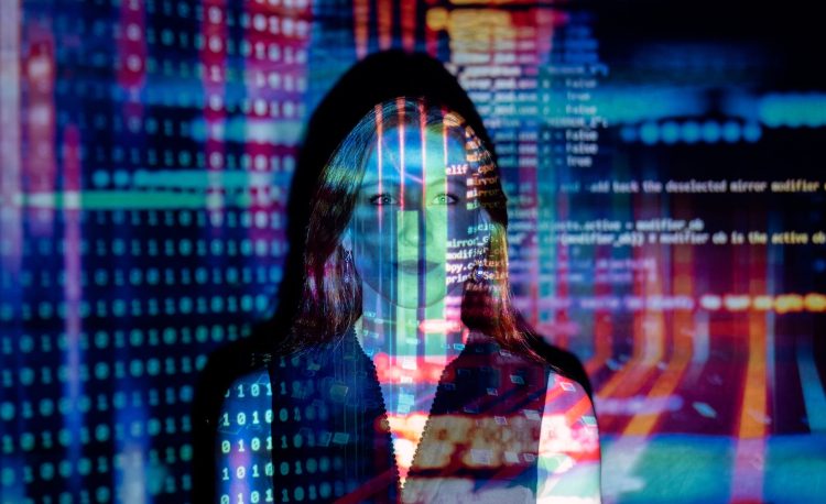 code projected over woman