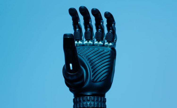 prosthetic arm on blue background