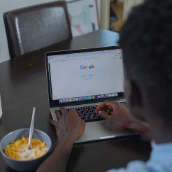 a person using google website on a laptop