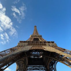 low angle shot of the eiffel tower against blue sky paris france