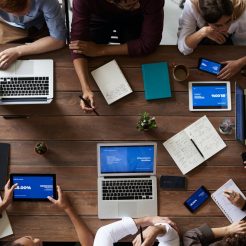 top view photo of people near wooden table