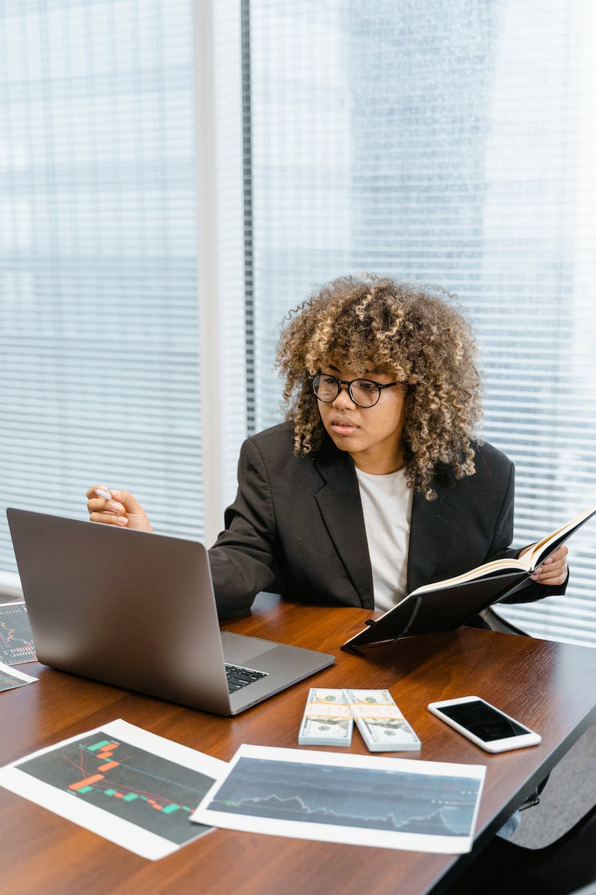 businesswoman looking at a laptop