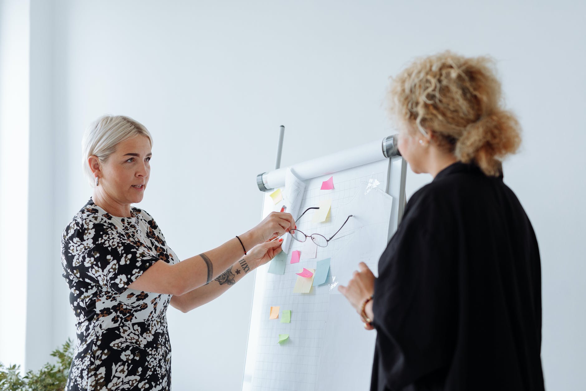 women discussing business together