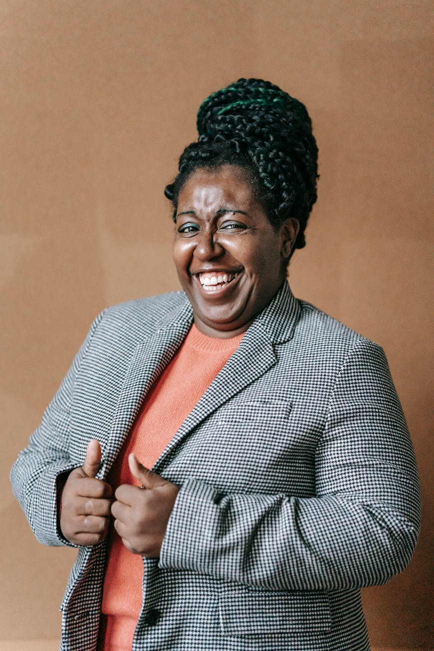 laughing formal woman in elegant jacket