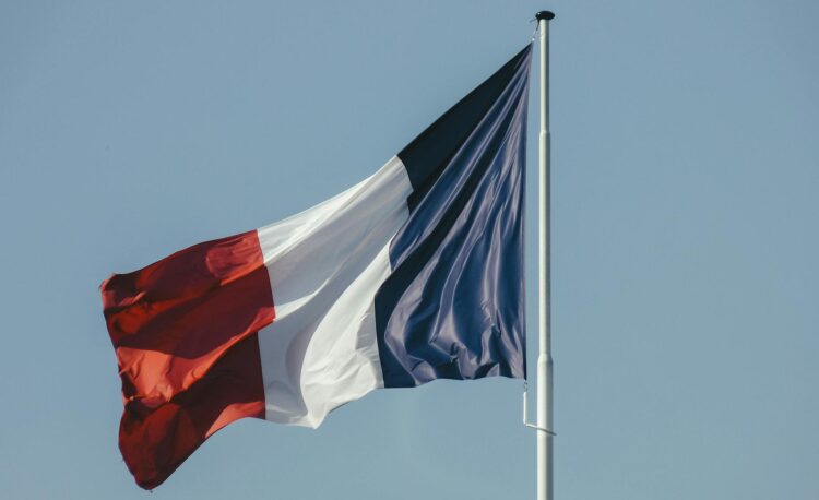 french flag against blue sky