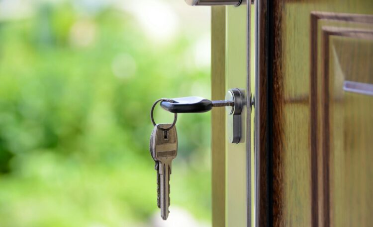 black handled key on key hole