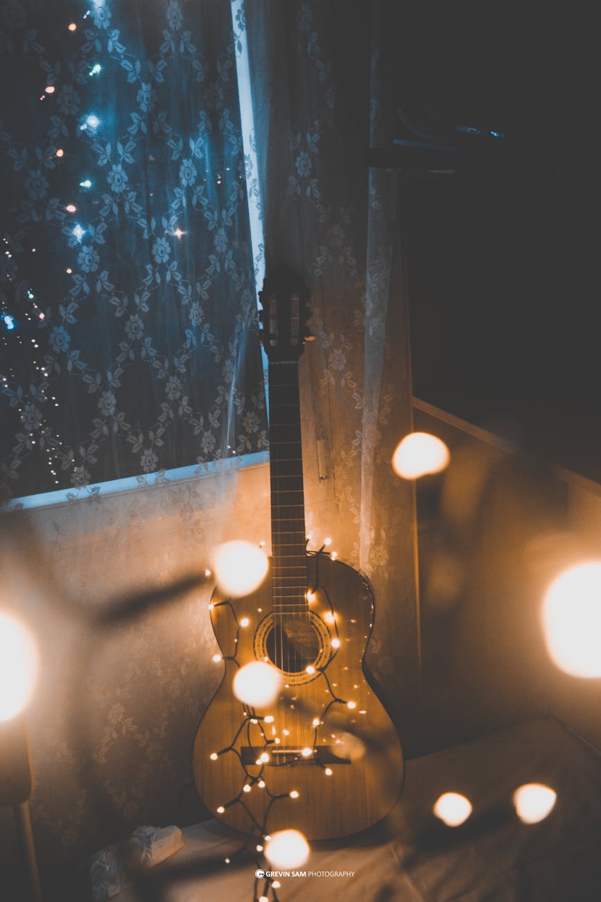 guitar covered with string lights