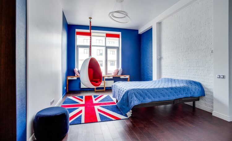 bedroom with red and navy furniture