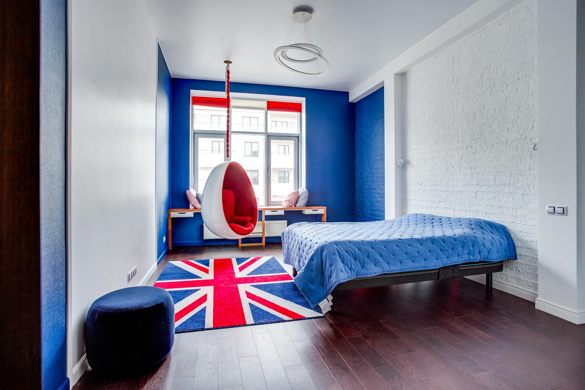 bedroom with red and navy furniture