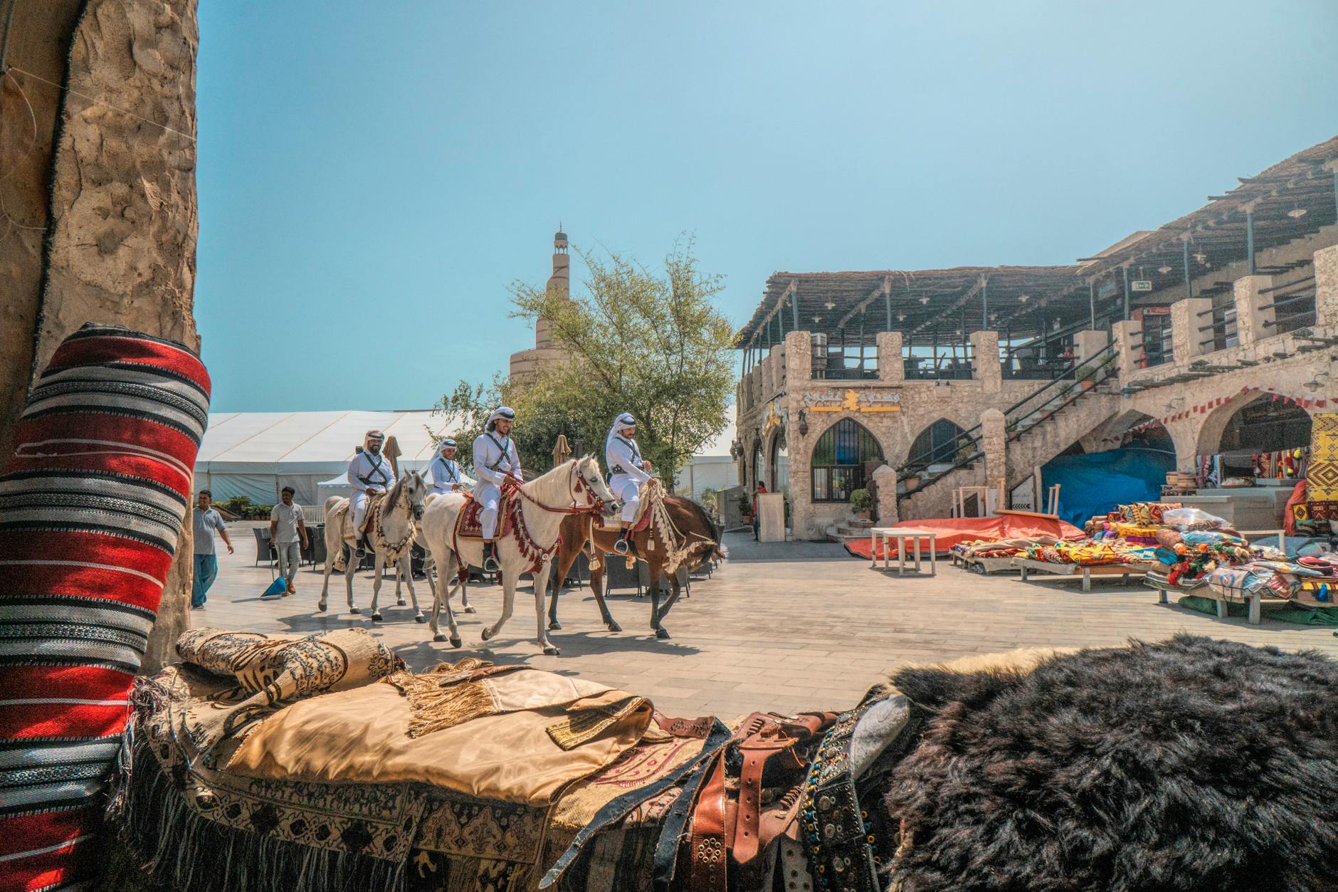 people riding on horses