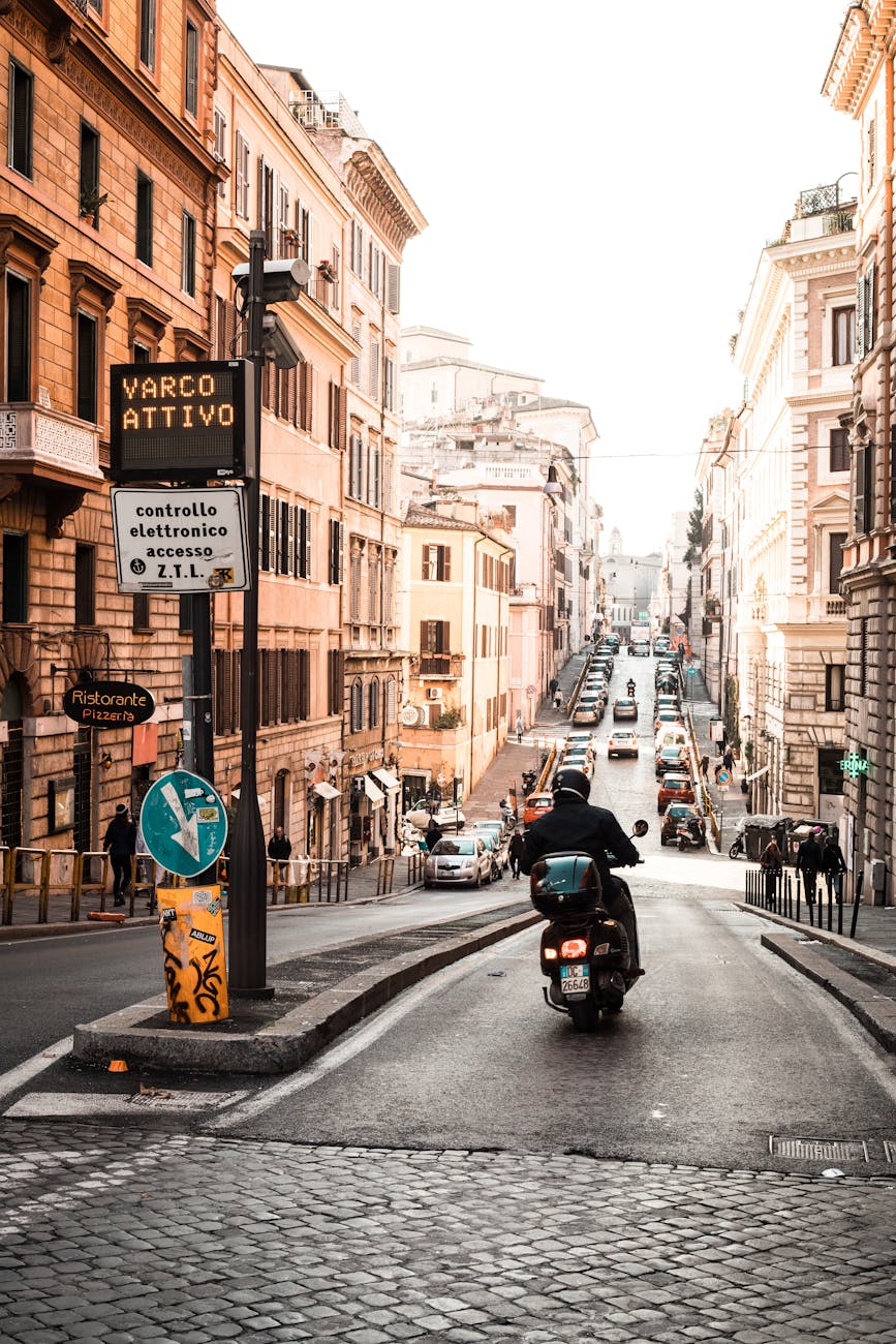 cars and motorcycle on the street