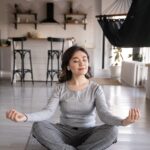 woman practicing yoga