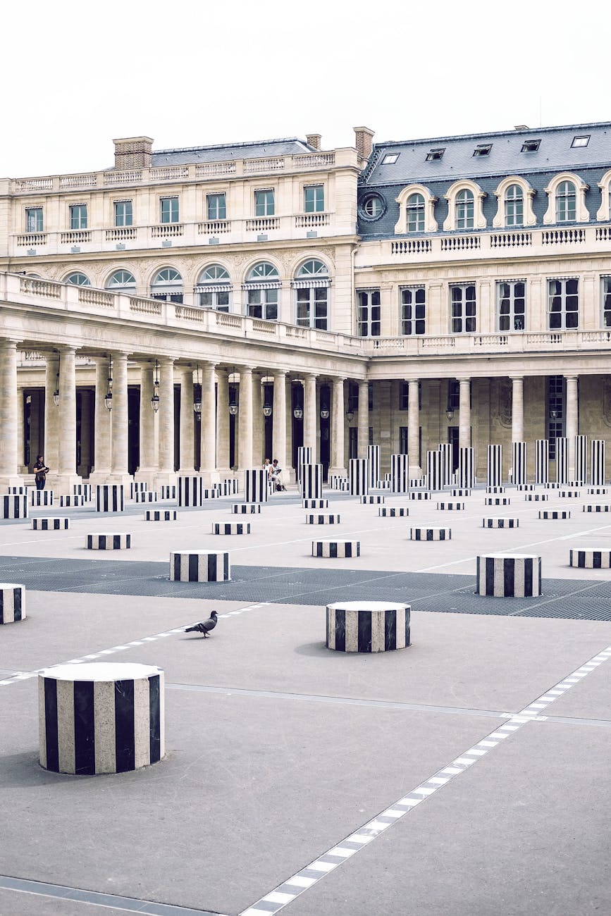 facade of palais royal with columns in town