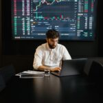 focused professional man using laptop