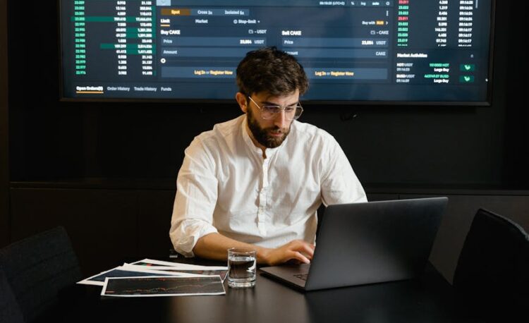 focused professional man using laptop